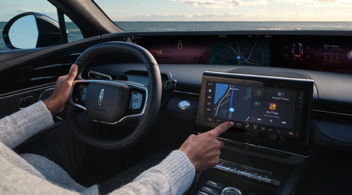 The driver of a 2024 Lincoln Nautilus® SUV interacts with the new Lincoln Digital Experience. | McKie Lincoln, Inc. in Rapid City SD