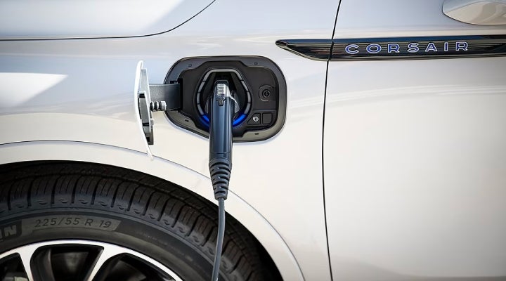 An electric charger is shown plugged into the charging port of a Lincoln Corsair® Grand Touring
model. | McKie Lincoln, Inc. in Rapid City SD
